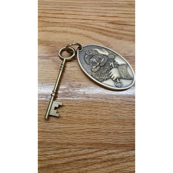 Hallmark Brass Colored Key Chain and Key - Picture 1 of 3